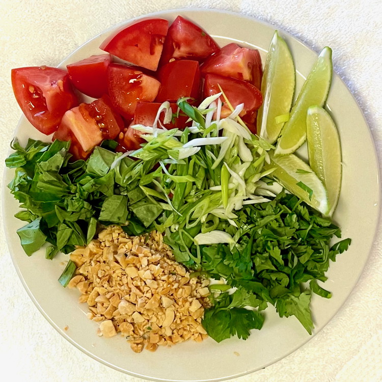 Image of In a large pot with a lid, bring the Penang spice blend, espelette pepper, and coconut milk to boil. 